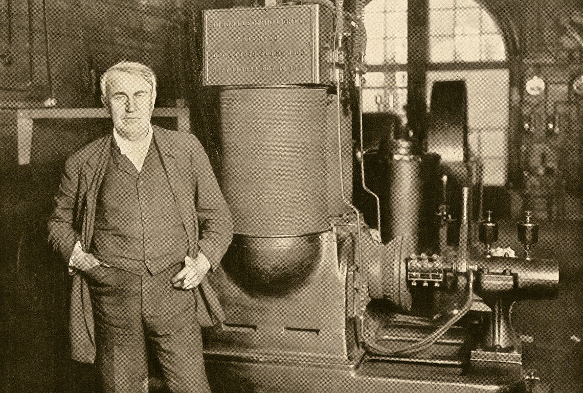 Thomas Edison with his dynamo that generated the first commercial electric light New York City