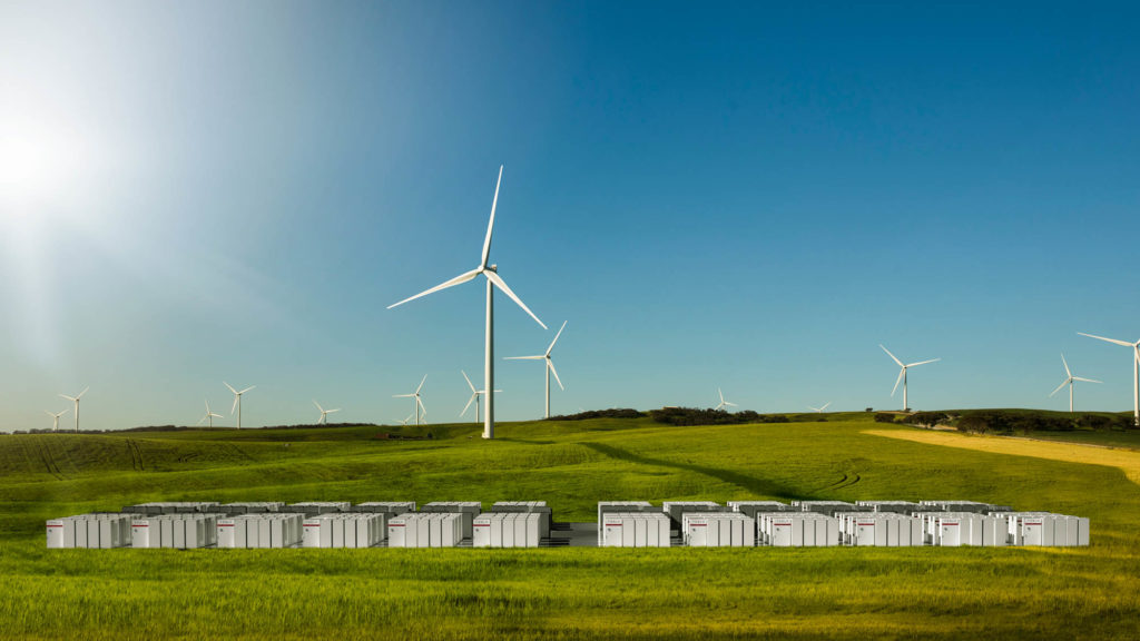 An Australian wind farm outfitted with Tesla batteries for storage.