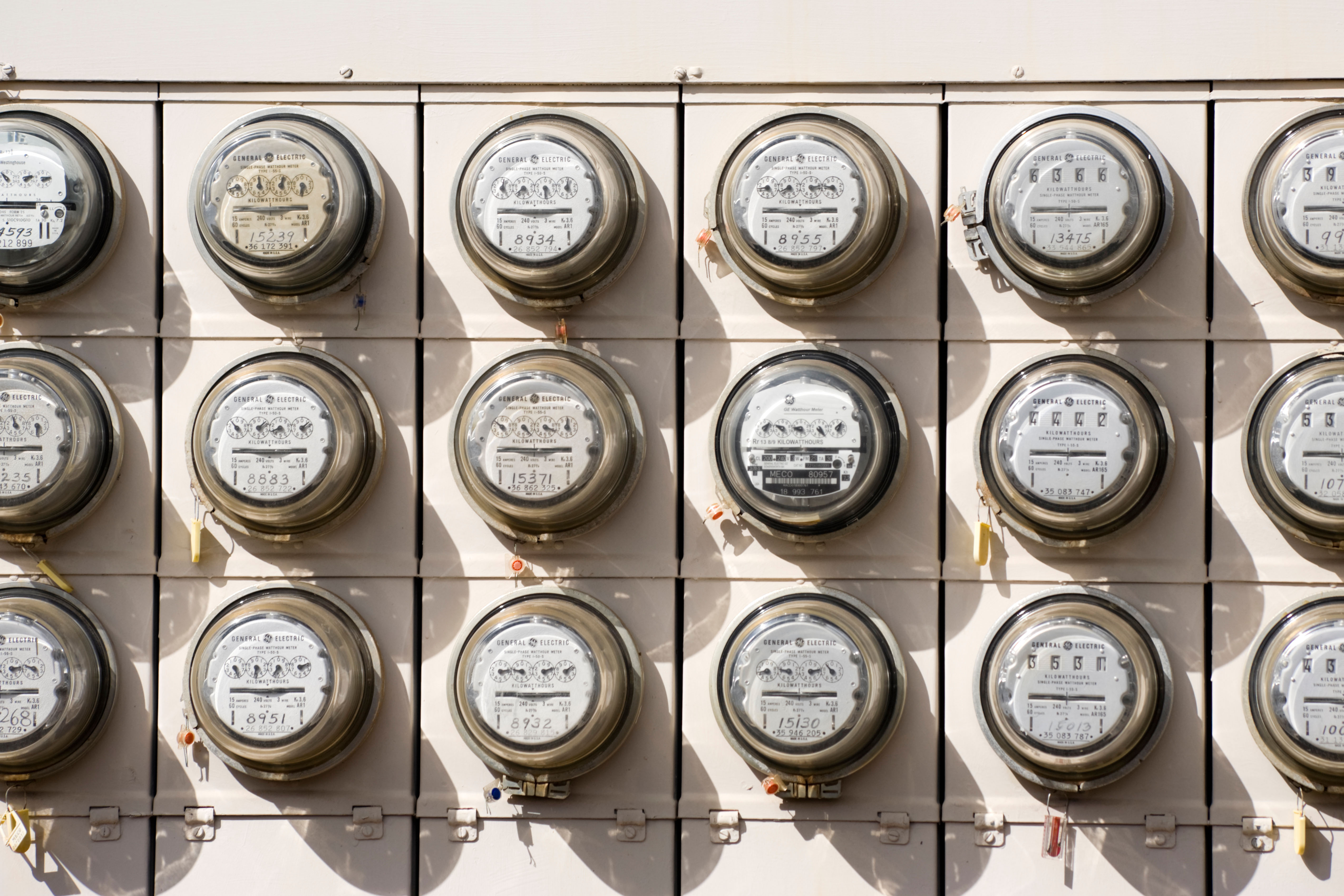 A bank of electric meters Alamy AT1J4P